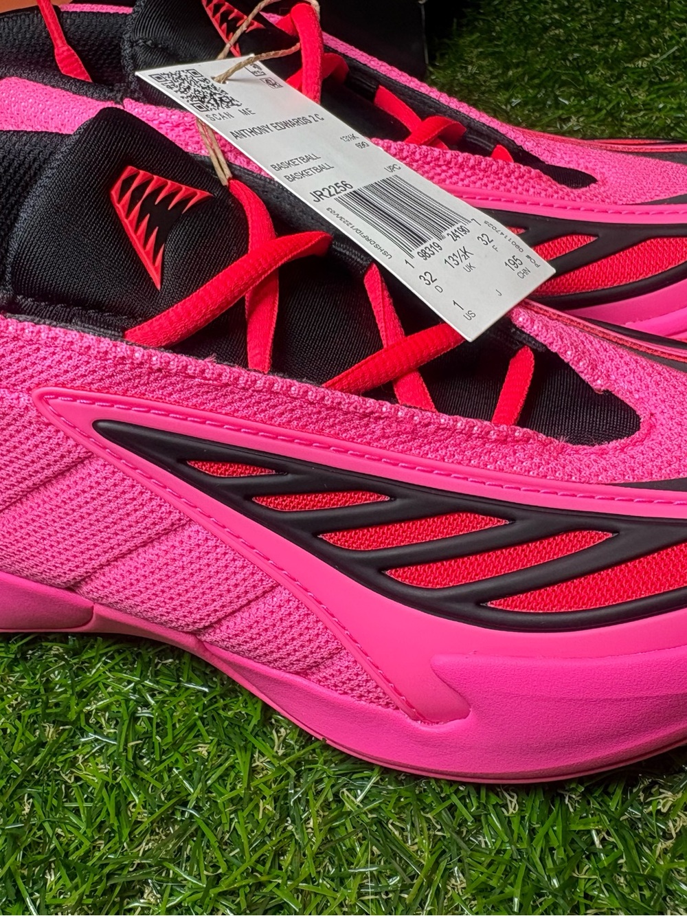 Adidas Anthony Edwards basketball sneakers. Hot Pink, black, red. Youth 1